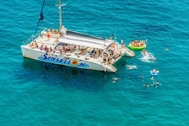 Barcelona: Catamaran Party Cruise with BBQ Meal - Where you meet the boat at Port Olímpic (and how not to waste time)