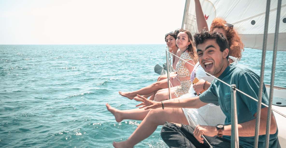 Barcelona: Midday or Sunset Sailing with Open Bar and Snacks - What You Actually Get Onboard: Open Bar, Snacks, and Real Deck Time