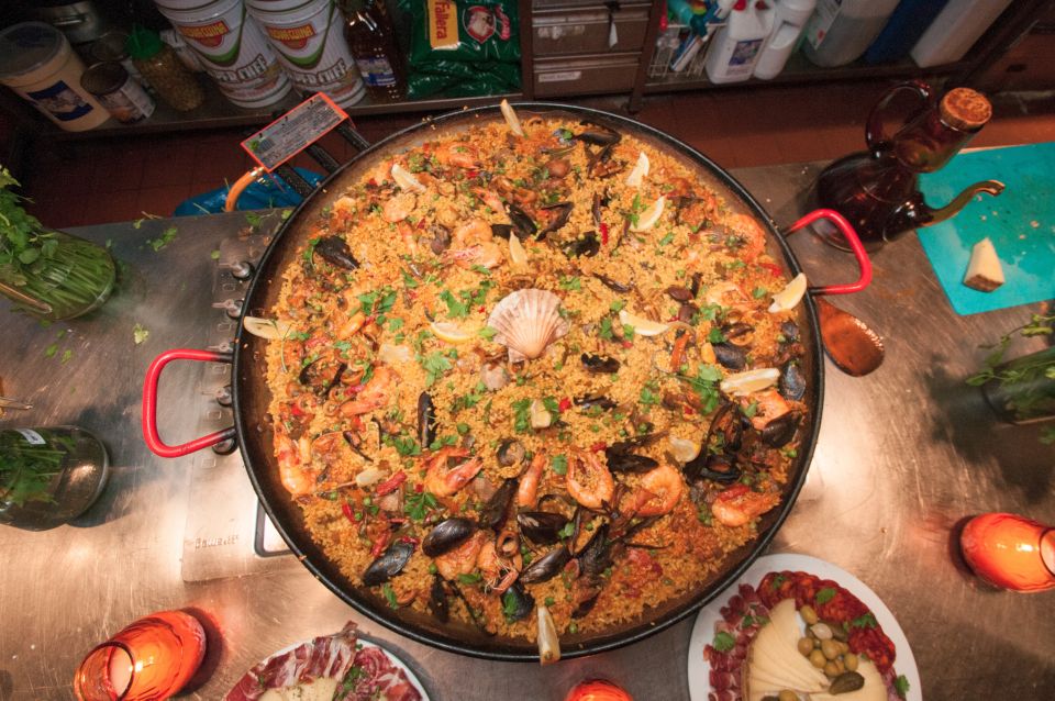 Barcelona: Paella Cooking Experience & Boqueria Market Tour - Key highlights you’ll feel fast