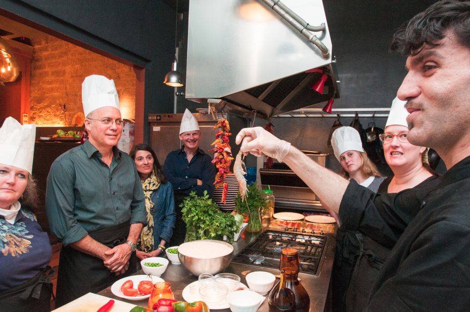 Barcelona: Paella Cooking Experience & Boqueria Market Tour - Sitting down to your seafood paella: what you actually get to taste
