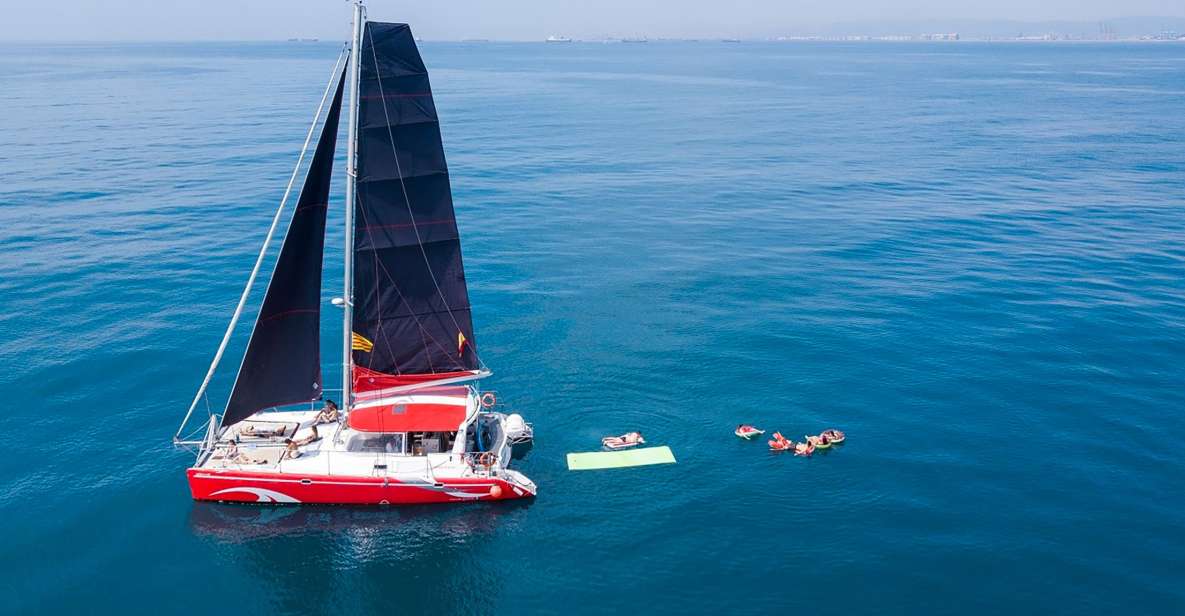 Barcelona: Sunset or Day Catamaran Cruise with Tapa & Drink - Marina Vela: the shortcut to real “Barcelona-from-the-water” views