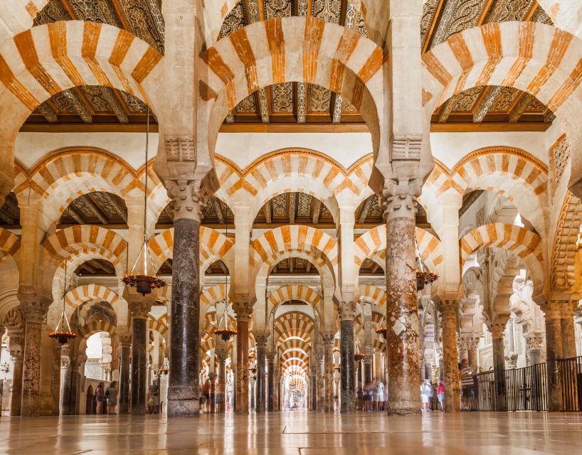 Cordoba Mosque & Jewish Quarter Tour with Tickets - From mosque to cathedral: the Ferdinand III transformation