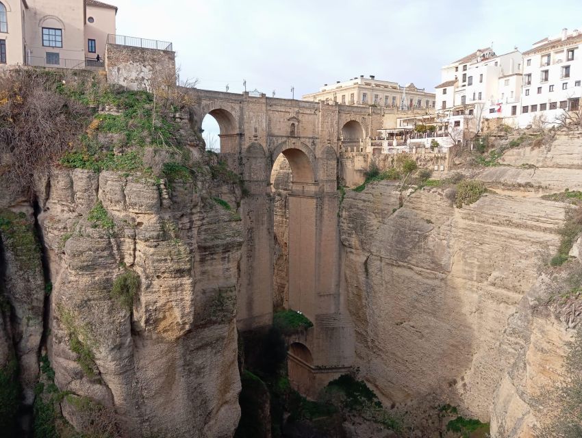 From Málaga: Ronda+Setenil de las Bodegas with Little Train - Ronda’s cliff edge: monuments, bridges, and old-town lanes