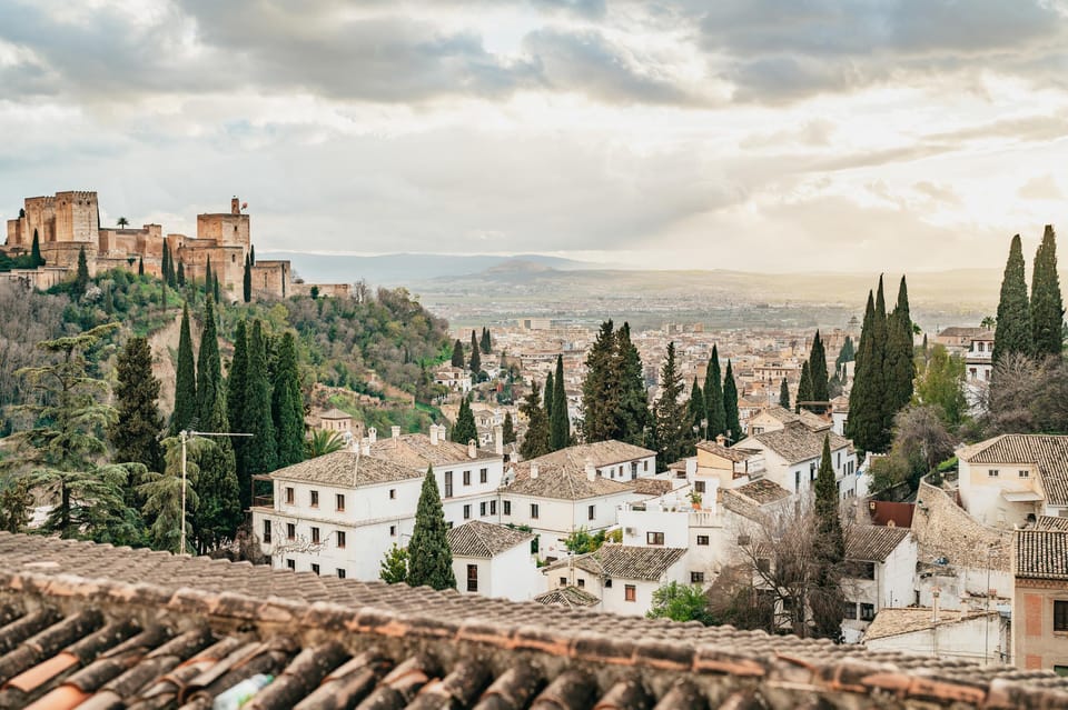 Granada: Albaicín and Sacromonte Guided Sunset Walking Tour - Albaicín’s UNESCO lanes: where the neighborhood becomes the story