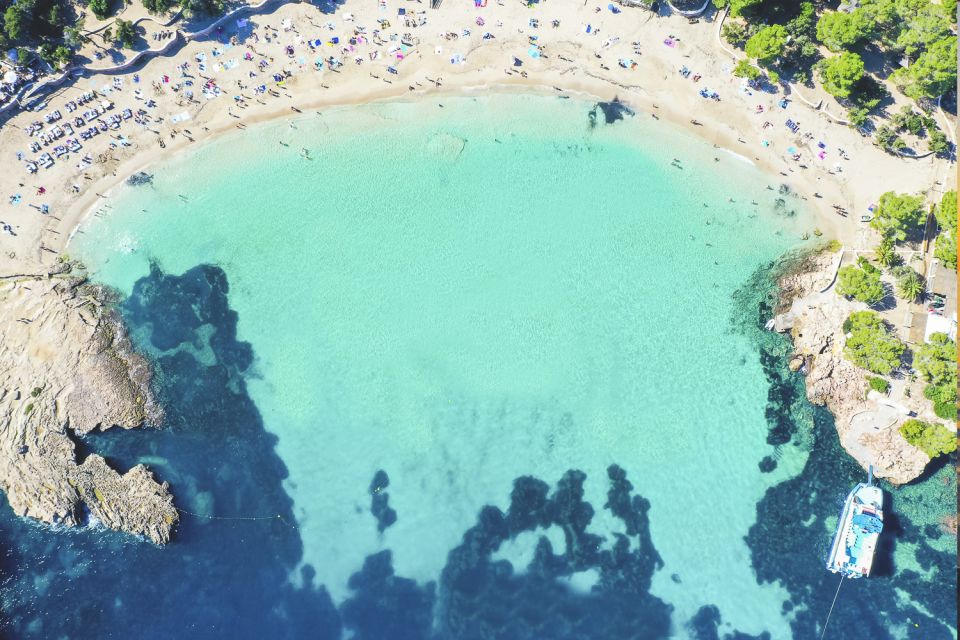 Ibiza: Beach Hopping Cruise w/ Paddleboard, Food, & Drinks - Cala Bassa: Cream-Colored Sand and a Swim Break That Actually Works