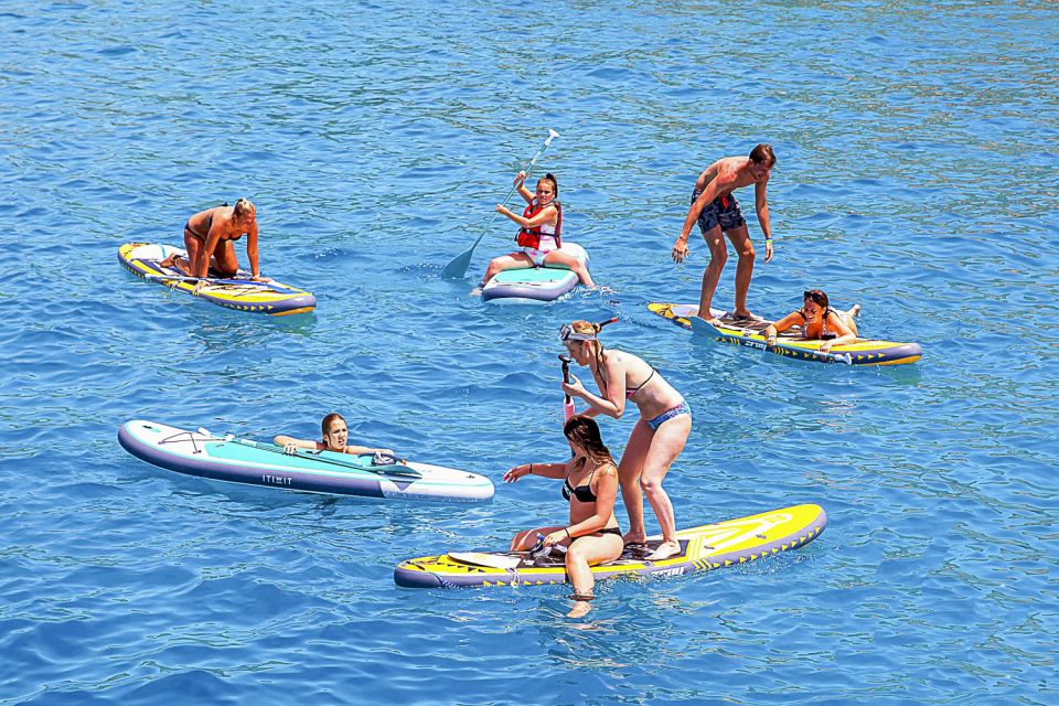 Ibiza: Beach Hopping Cruise w/ Paddleboard, Food, & Drinks - Cala Comte: Classic Beach Energy Without the Land Transportation Hassle