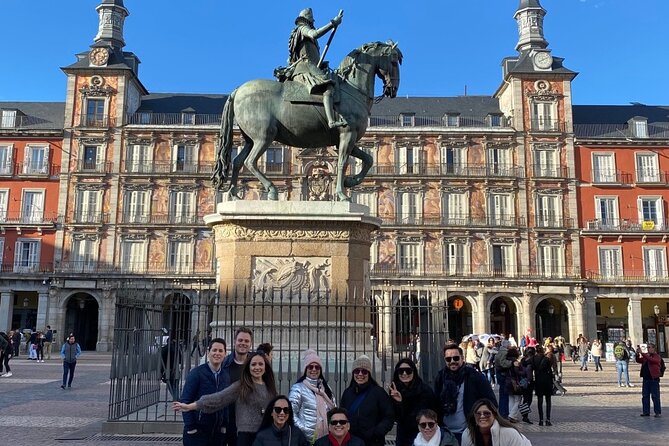 Madrid Essential: Historic Center, Plaza Mayor & Royal Palace - Puerta del Sol: time-square energy, New Year grapes, and Km 0