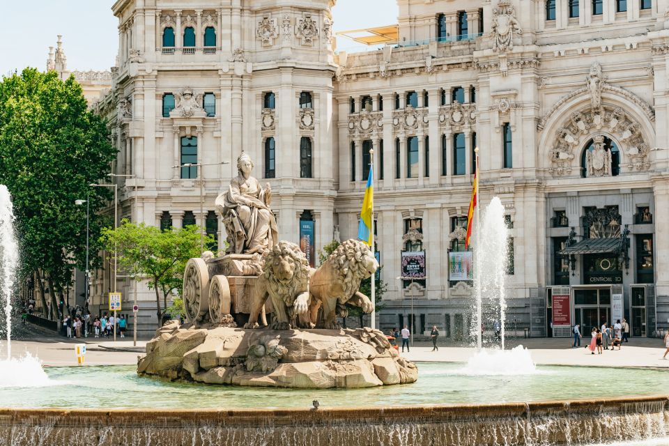 Madrid: Panoramic Route City Tour - Guided walking tour and the flamenco drink: why these add-ons help