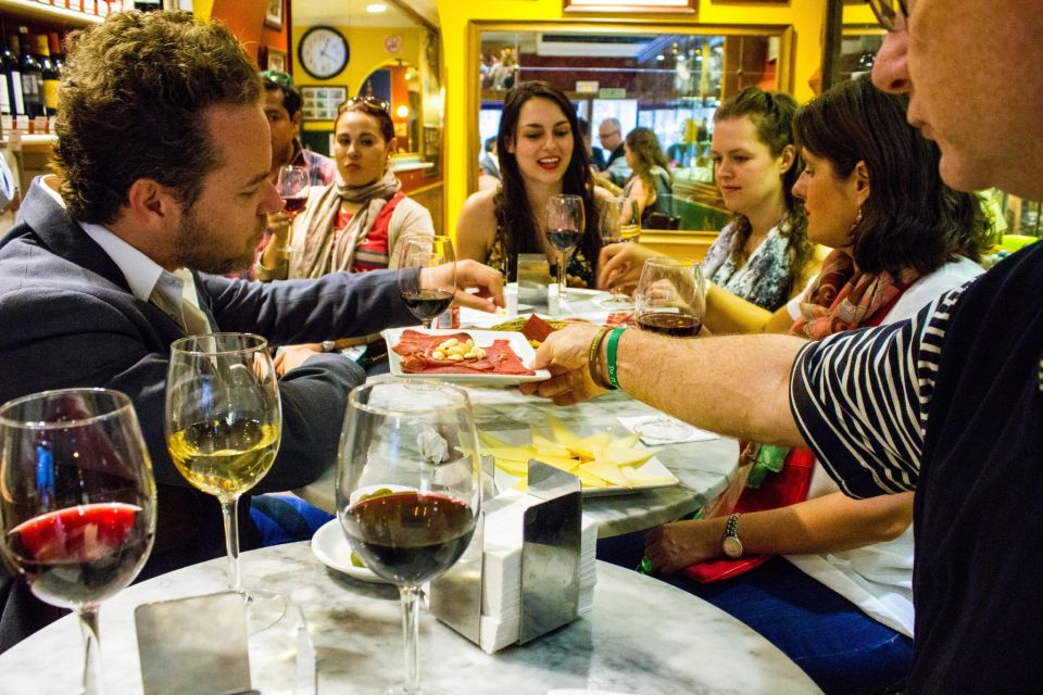 Madrid: Tapas & Wine Tasting Tour with Local Guide - From Lorca to first sips: starting in Plaza de Santa Ana