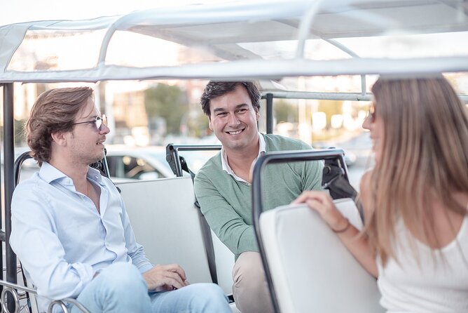 Madrid Welcome Tour with Local Guide in Eco Tuk Tuk Private - Atocha station: Madrid’s busy heartbeat in one glance