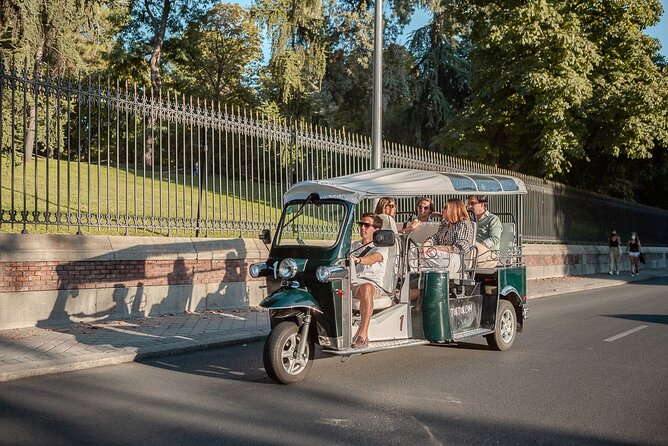 Madrid Welcome Tour with Local Guide in Eco Tuk Tuk Private - The Spanish Courts and the lost steps: civic drama, classic design