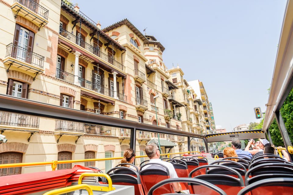 Malaga: City Sightseeing Hop-On Hop-Off Bus Tour - Red Route: Playa de la Malagueta, the harbor, and the old-town rhythm