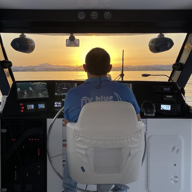 Málaga: Sunset Catamaran Trip - Onboard comfort: bar, bathrooms, and that front-net hangout