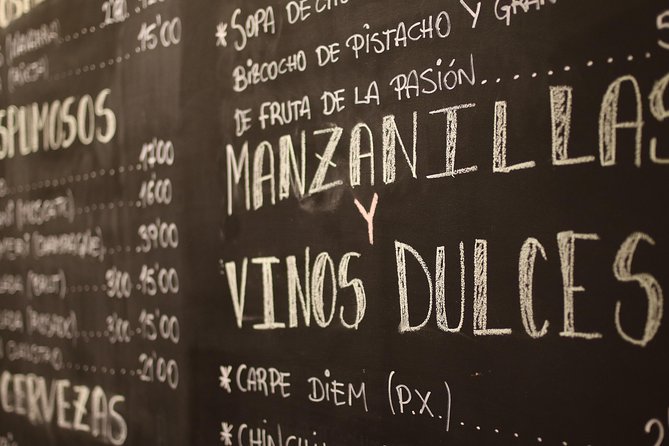 Malaga Wine & Tapas Small Group Guided Tour - Antigua Casa de Guardia (1840): barrel wine and tavern tradition