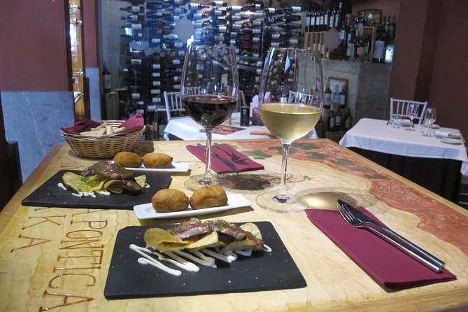 Malaga Wine & Tapas Small Group Guided Tour - Plaza de las Flores: classic Andalusian tapas with wine pairings