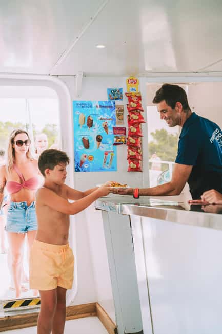 Menorca: Coves and Beaches Boat Trip w/ optional Paella - Son Saura: the first beach stop that sets the tone