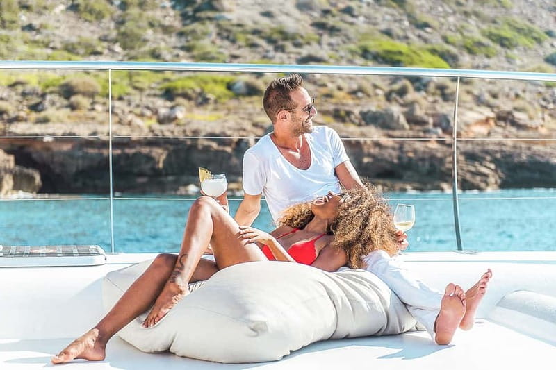 Palma de Mallorca: Half-Day Catamaran Tour with Buffet Meal - Sunset Catamaran: DJ Tunes and Golden Hour Energy
