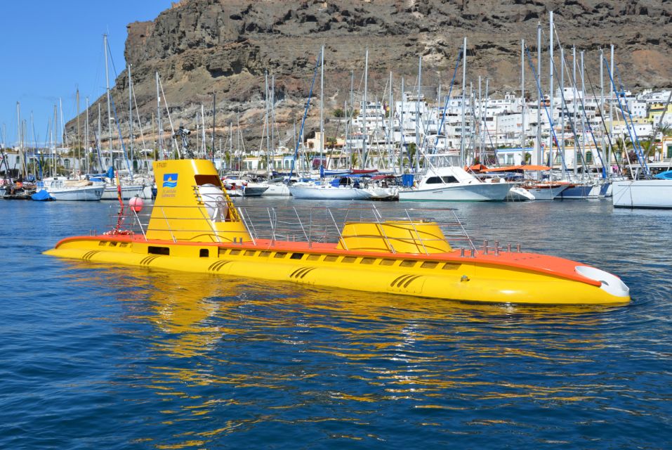 Puerto de Mogán: Submarine Tour - Boarding the Golden Shark: comfort, safety, and headphones