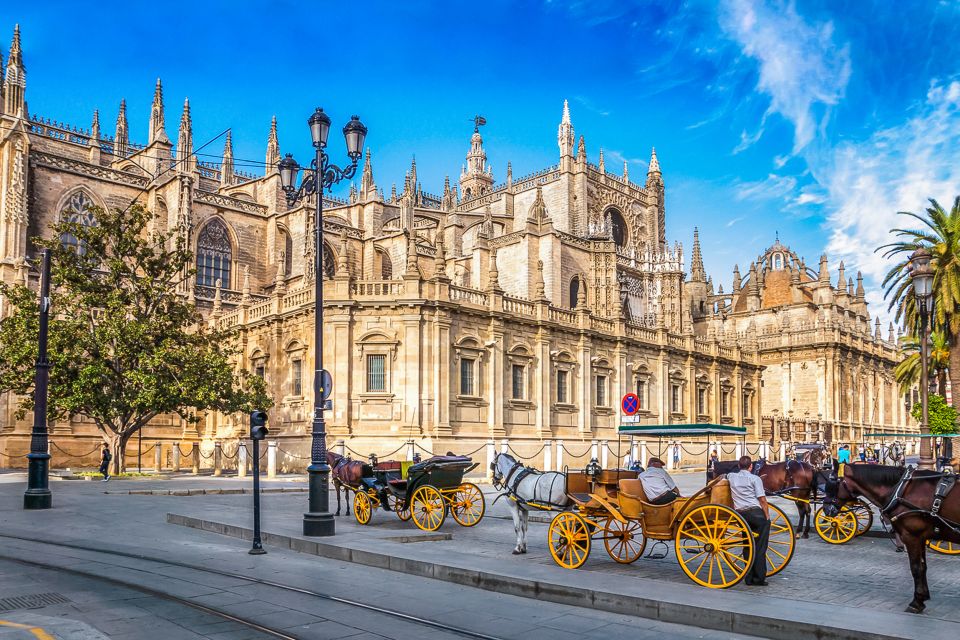 Seville: Cathedral and La Giralda Entry Ticket - La Giralda Tower Climb: Ramps, Views, and Photo Reality
