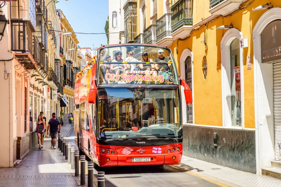 Seville: City Sightseeing Hop-On Hop-Off Bus Tour - What you actually learn on the ride: Torre del Oro, Gothic grandeur, flamenco, and Alcázar gardens