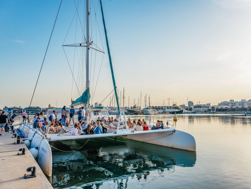 Valencia: Sailing Catamaran Cruise with Sunset Option and DJ - Inside the catamaran experience: nets, seating, crowd levels, and comfort